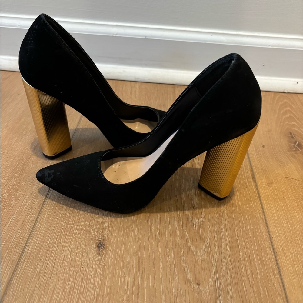 Black and gold heels